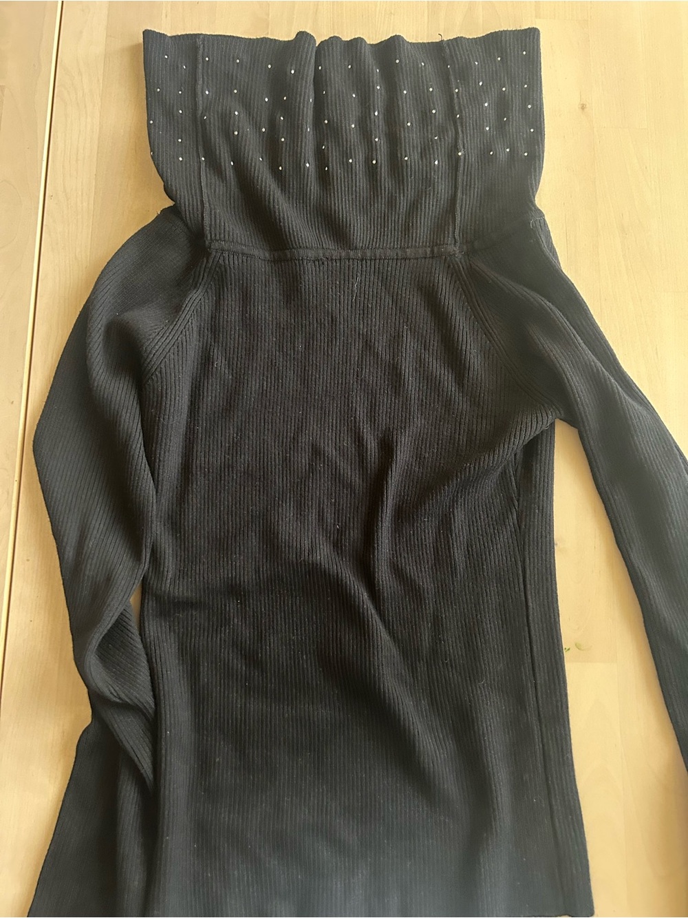 Women’s Black Ribbed Off-Shoulder Sweater with Embellished Neck
